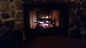 Enjoy a cozy night by the vented gas log fireplace