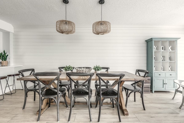 Dining room with seating for eight and additional seating at the bar!