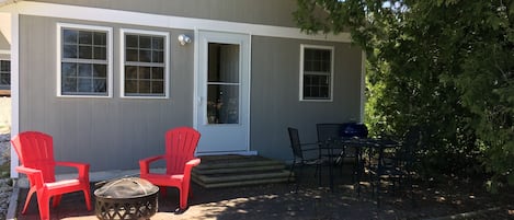 Enjoy either sun or shade on the front porch.