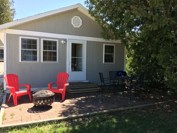 Enjoy either sun or shade on the front porch.