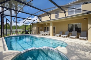 View from Pool to back of Villa and Side Yard, Sunning Deck, additional chairs