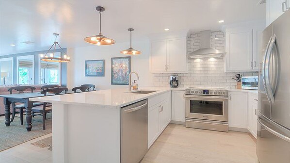 Kitchen with quartz counters and high-end stainless steel appliances