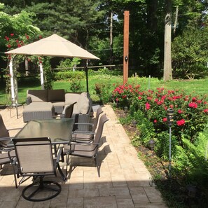 Outdoor patio in spring with lots of roses