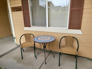 Quiet sitting area at the front of the house. Great place for favorite beverage.