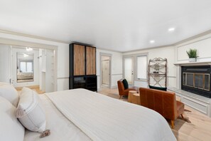 Large Master Bedroom luxurious king bed, gas fireplace, walk-in closet, bathroom