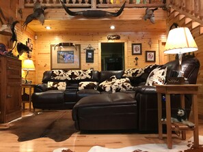 Leather sofa has 3 recliner seats , also love seat has 2 reclining seats .