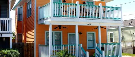 A colorful and beachy home awaits you.