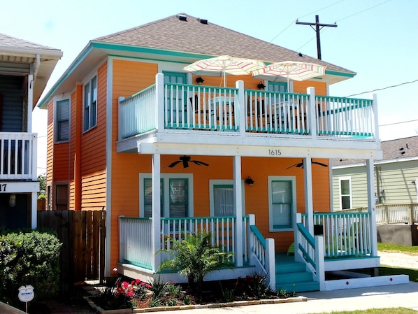 A colorful and beachy home awaits you.