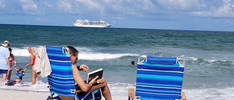 Relaxing at the beach. Primary Photo 