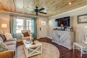 Lots of natural light in the open space living area. Blinds/drapes  as well