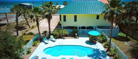 Beautiful private pool with the beach just across the street!