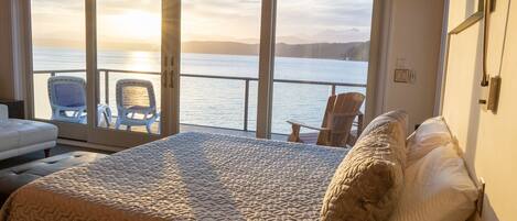 Luxury Lookout Hood Canal Vacation Rental: Enjoy the sunset from your king bed