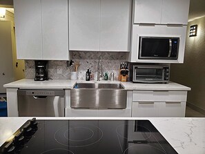 stove top, microwave, convection oven, dishwasher, full size refrigerator 