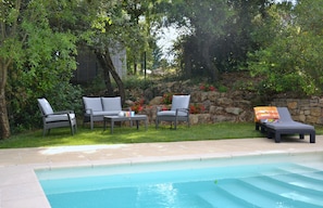 Shaded terrace by the pool