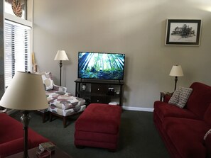 55 inch TV with cable  in the living room.