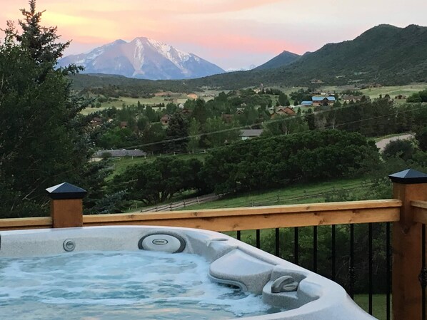 Relax in this 7-person hot tub, with chaise seat, while taking in scenery