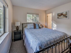 The master, super-comfy new queen bed, a 6-drawer dresser, TV, and full bath.