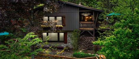 Our mountain cabin nestled among lush trees give the property treehouse views.