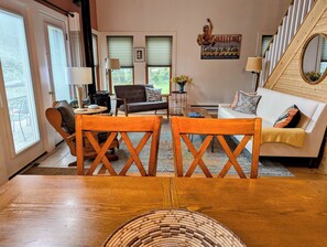 The dining and living area. Table seats 6, extra chairs are in closets.