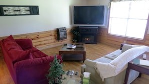Living Room - 60" HDTV with Electric Fireplace.