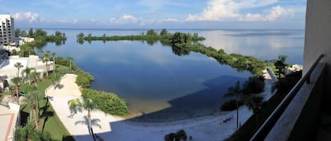 Gulf view from balcony of  white sandy beach & nature trail