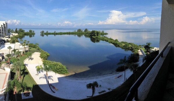 Gulf view from balcony of  white sandy beach & nature trail