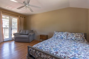 A roomy master bedroom with an optional twin bed fold out couch. 