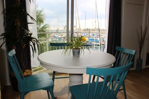 Prime dining location, comfortably seats four. Enjoy the beautiful harbor view. 