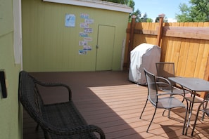 Front deck, walk out patio door not in picture but on left side by chair.