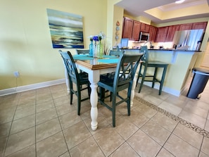 Dining Room- Enjoy meals from the Kitchen while taking in views of the Gulf 