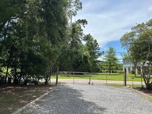 Gated property - gates swing out 24 ft driveway