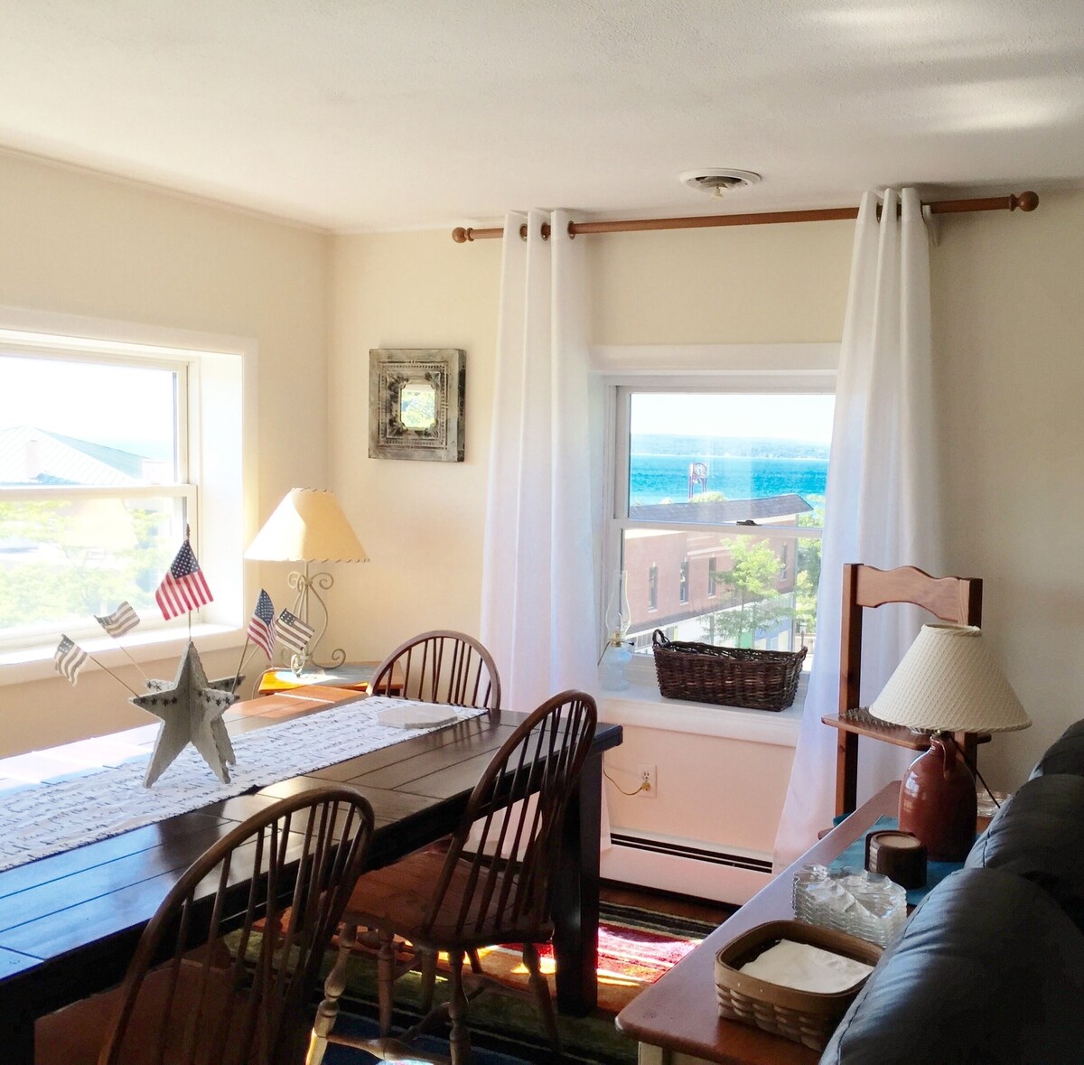 SUNSET GLORY -Best Views Of The Bay In Downtown Petoskey – Where You Want To Be!