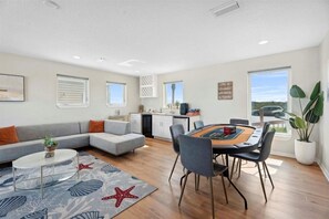 Entertainment room: pool table, poker table. speaker system, and board games