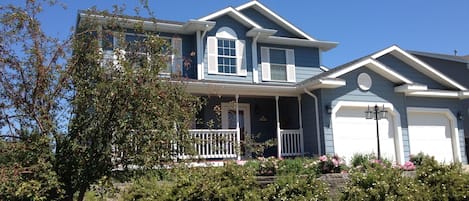 Exterior front of home; love the springtime blooms!!