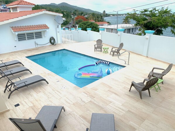 Added in 2021, heated pool behind the home. Pool floats and toys included!