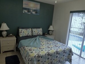 2nd bedroom has sliding doo to the pool area.