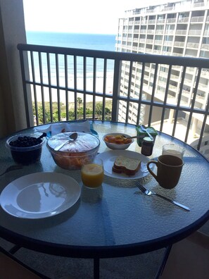 Breakfast with a view. Seating for your party of 8 to dine on the balcony!
