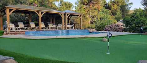 Enjoy a round with your private putting green adjacent to the pool and Gazebos