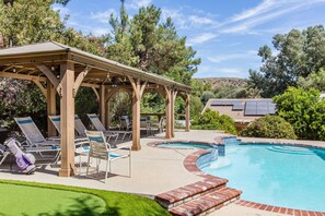 Perfect place to lounge watching family/friends enjoy the Jacuzzi and Pool