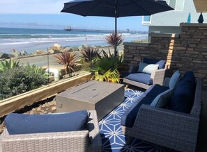 Current patio furniture, rug and umbrellas are navy blue. 