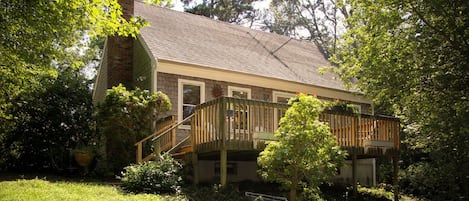 Backyard view of house and patio.