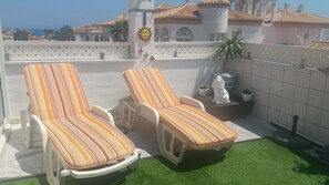 sun bathing on the terrace