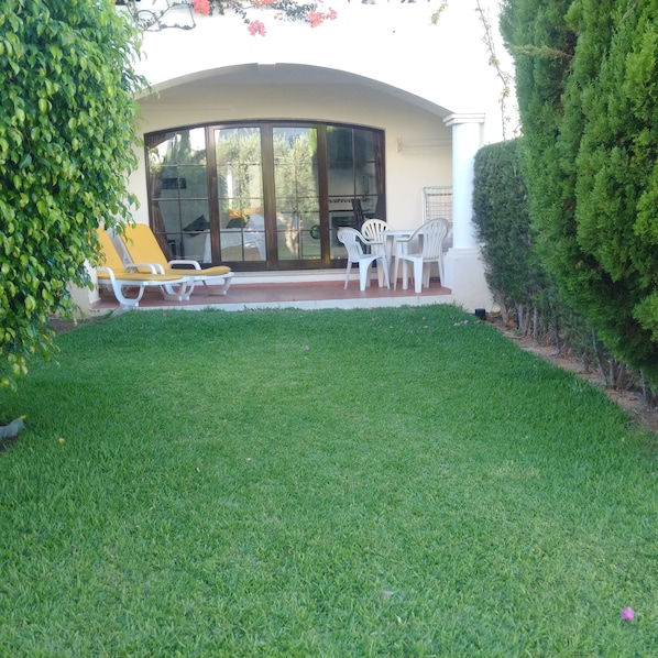 Private terrace with loungers, table & chairs