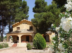 Main facade with garden and terrace