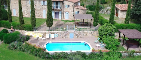 External view of Tuscany Villa with pool and jacuzzi