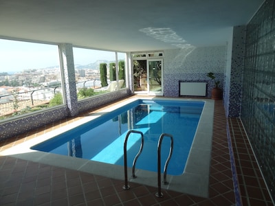 Swimming pool solarium with views