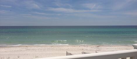 Private porch located off of the living room/ kitchen perfect for sunbathing!