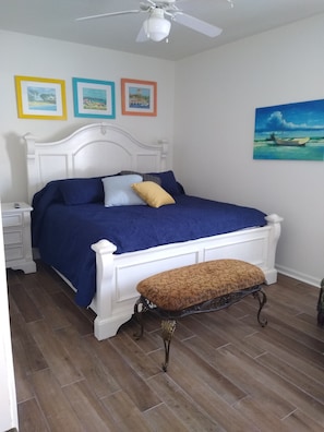 Master Bedroom with King Bed, Bench, Large Dresser, Chair, Nightstand 