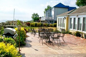 Grill and patio area with lakefront views.