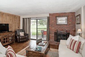 Living room with view of golf course